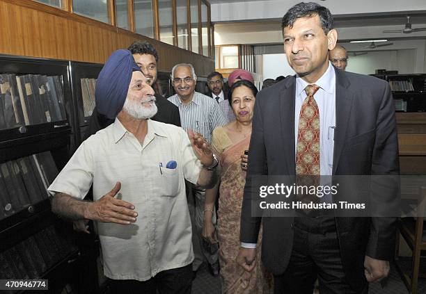 Governor Raghuram Rajan inspecting the library before interactive session at Centre for Research in Rural and Industrial Development office on April...
