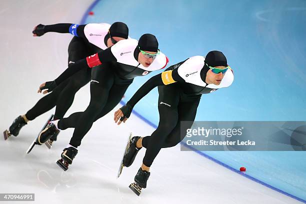 Mathieu Giroux, Lucas Makowsky, Denny Morrison of Canada compete during the Men's Team Pursuit Semifinals Speed Skating event on day fourteen of the...