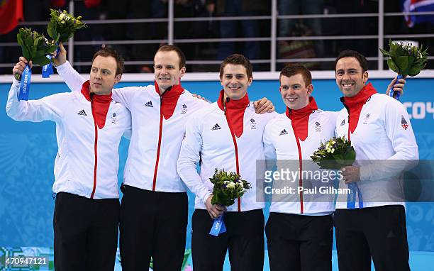 Silver medalists Tom Brewster, Michael Goodfellow, Scott Andrews, Greg Drummond and David Murdoch of Great Britain during the flower ceremony for the...