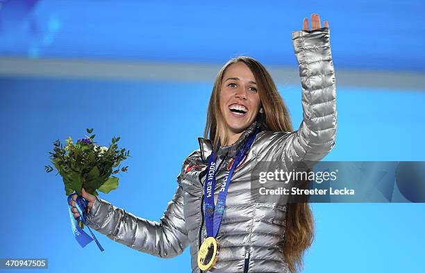 Gold medalist Maddie Bowman of the United States celebrates during the medal ceremony for the Women's Ski Halfpipe on day fourteen of the Sochi 2014...