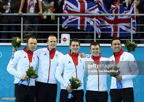 Great Britain step up to take the silver medal position L to R Tom Brewster, Michael Goodfello, Scott Andrew, Greg Drummond and Skip David Murdoch...