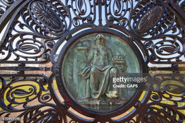 concordia on an entrance gate of the hague's peace palace - peace palace the hague stock pictures, royalty-free photos & images