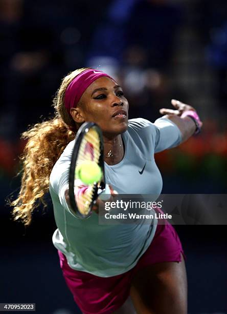 Serena Williams of the USA in action against Alize Cornet of France during the semi finals of the WTA Dubai Duty Free Tennis Championship at the...