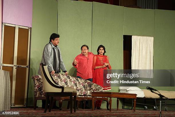 Bollywood actors Shatrughan Sinha, Rakesh Bedi and Bhavna Balsaver perform during the on-stage comic play, Pati, Patni aur Main on April 19, 2015 in...