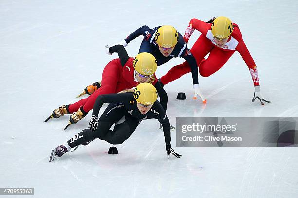 Jessica Smith of the United States, Jianrou Li of China, Alang Kim of South Korea and Patrycja Maliszewska of Poland compete in the Short Track...