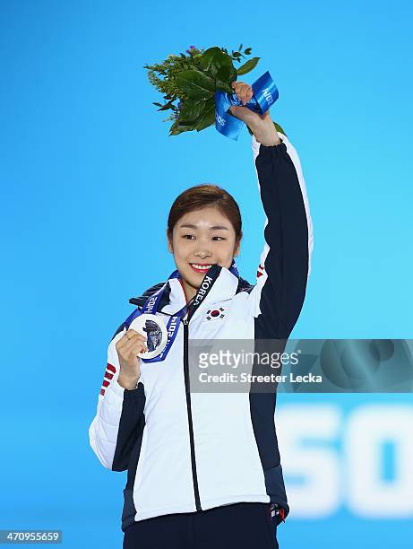 Silver medalist Yuna Kim of South Korea celebrates during the medal for the Women's Free Figure Skating on day fourteen of the Sochi 2014 Winter...