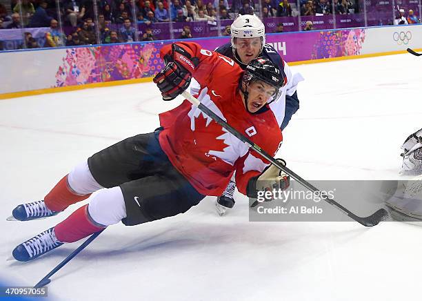 Sidney Crosby of Canada falls to the ice during the Men's Ice Hockey Semifinal Playoff against the United States on Day 14 of the 2014 Sochi Winter...