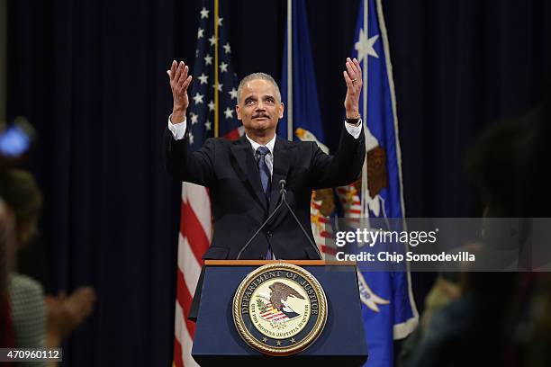 Attorney General Eric Holder thanks Justice Department employees as he delivers his parting remarks at the Robert F. Kennedy building April 24, 2015...