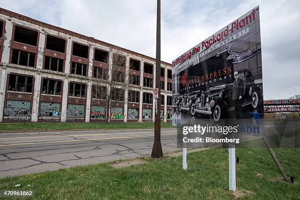 Signage advertising Arte Express Detroit LLC's development plan stands at the site of the abandoned Packard auto assembly plant in Detroit, Michigan,...