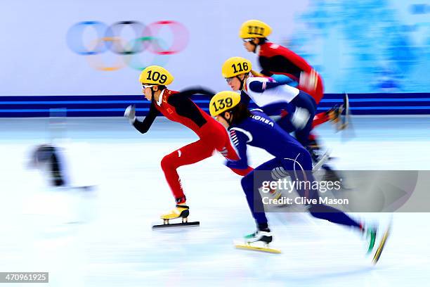 Kexin Fan of China, Suk Hee Shim of South Korea, Elise Christie of Great Britain and Jianrou Li of China compete in the Short Track Women's 1000m...