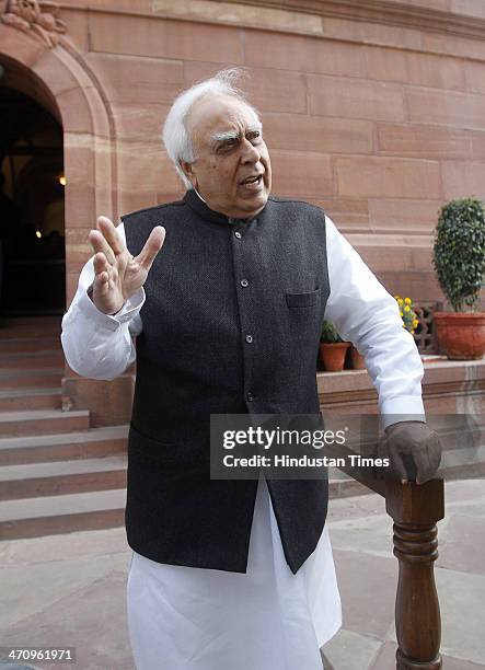 Union Minister Kapil Sibal at Parliament House on the last day of 15th Lok Sabha on February 21, 2014 in New Delhi, India. Rajya Sabha passed the...