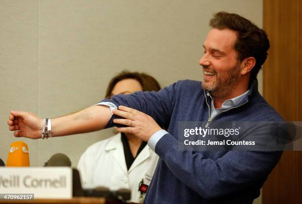 Christopher O'Neill, husband of H.R.H. Princess Madeleine of Sweden shows off the foot print of their new baby daughter at a press conference at...