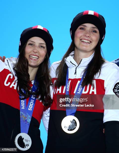 Silver medalist Kelsey Serwa of Canada and Gold medallist Marielle Thompson of Canada celebrate during the medal ceremony for the Women's Ski Cross...