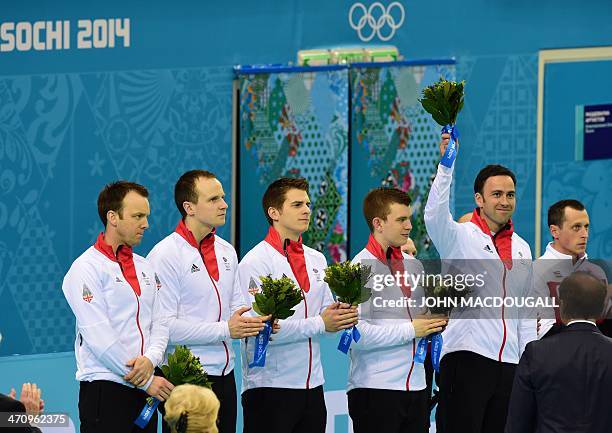 Great Britain's silver medallists Tom Jr Brewster, Michael Goodfellow, Scott Andrews, Greg Drummond and David Murdoch pose on the podium during the...