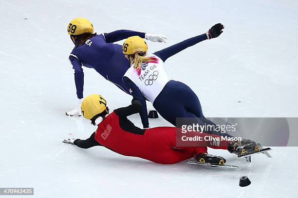 Jianrou Li of China slides into the way of Elise Christie of Great Britain while competing in the Short Track Women's 1000m Semifinals on day...