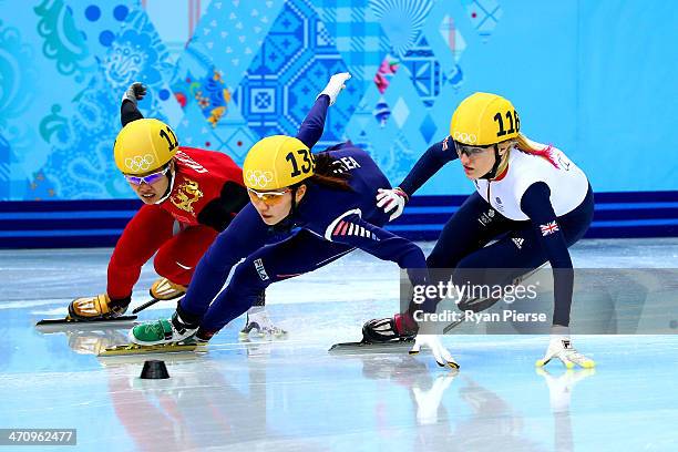 Jianrou Li of China, Suk Hee Shim of South Korea and Elise Christie of Great Britain compete in the Short Track Women's 1000m Semifinals on day...