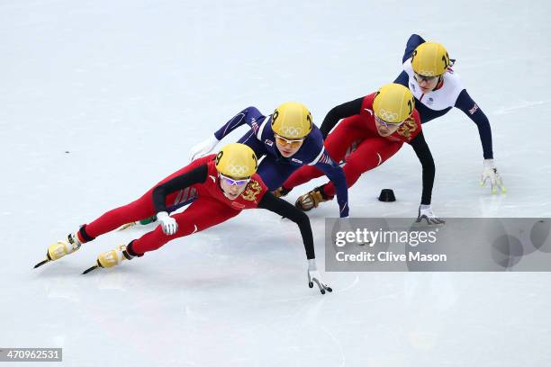 Kexin Fan of China, Suk Hee Shim of South Korea, Jianrou Li of China and Elise Christie of Great Britain compete in the Short Track Women's 1000m...