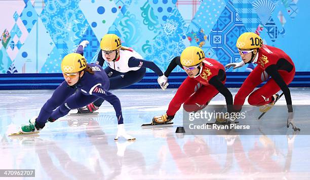 Suk Hee Shim of South Korea, Elise Christie of Great Britain, Jianrou Li of China and Kexin Fan of China compete in the Short Track Women's 1000m...