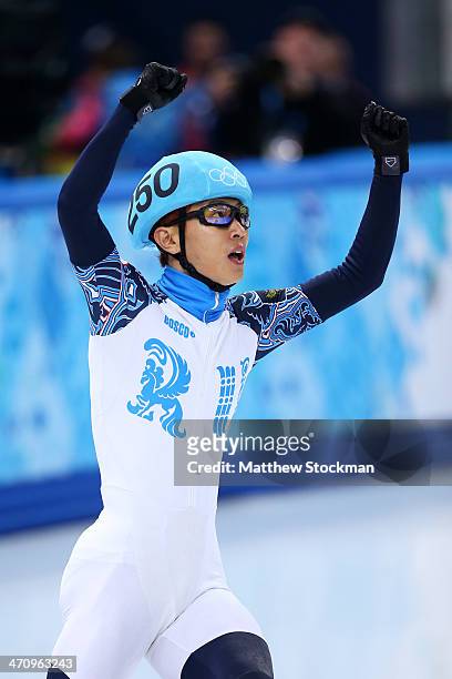 Victor An of Russia celebrate winning the gold medal in the Short Track Men's 500m Final A on day fourteen of the 2014 Sochi Winter Olympics at...