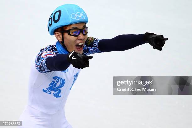 Victor An of Russia celebrate winning the gold medal in the Short Track Men's 500m Final A on day fourteen of the 2014 Sochi Winter Olympics at...