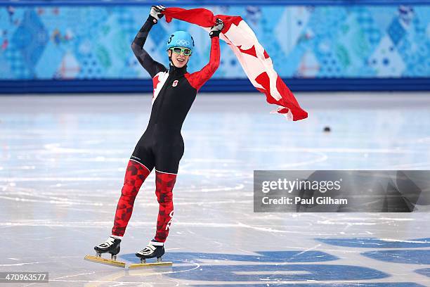 Charle Cournoyer of Canada celebrates winning the bronze medal in the Short Track Men's 500m Final A on day fourteen of the 2014 Sochi Winter...
