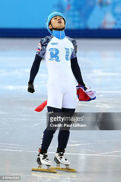 Victor An of Russia celebrates winning the gold medal in the Short Track Men's 500m Final A on day fourteen of the 2014 Sochi Winter Olympics at...