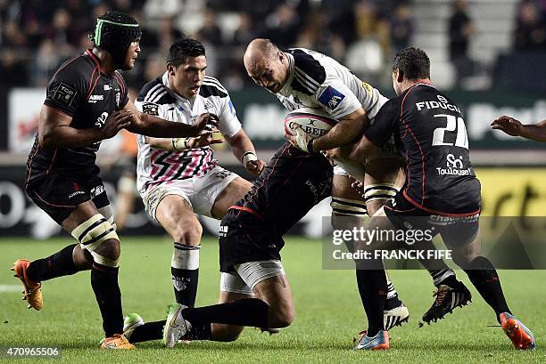 Paris' Italian number 8 and captain Sergio Parisse vies with Toulouse's New Zeland fly-half Luke McAlister during the French Top 14 rugby match...