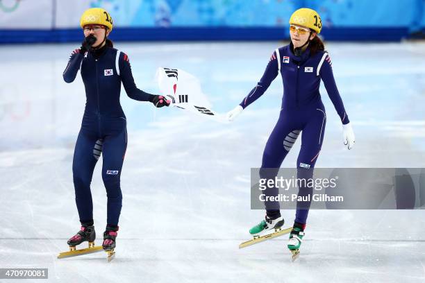 Gold medalist Seung-Hi Park and bronze medalist Suk Hee Shim of South Korea celebrate in the Short Track Women's 1000m Final A on day fourteen of the...
