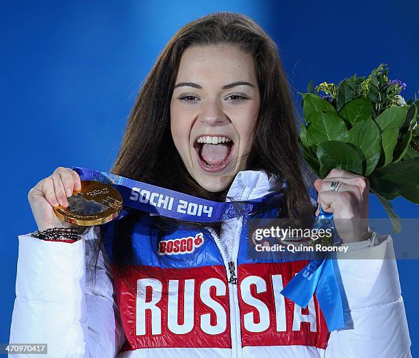 Gold medalist Adelina Sotnikova of Russia celebrates during the medal ceremony for the Women's Free Figure Skating on day fourteen of the Sochi 2014...