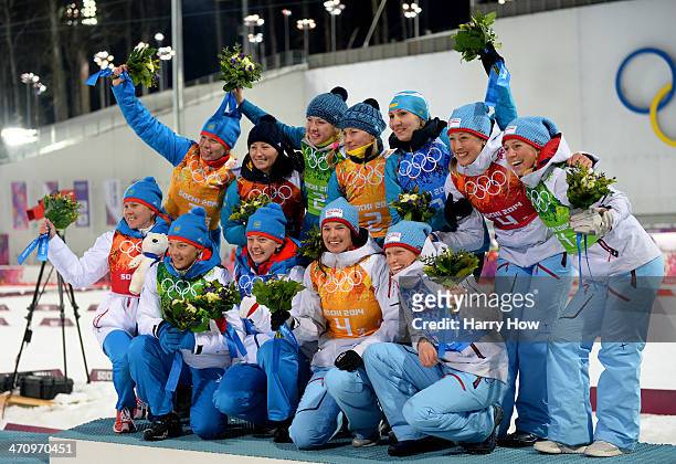 Silver medalists Yana Romanova, Olga Zaitseva, Ekaterina Shumilova and Olga Vilukhina of Russia, gold medalists Vita Semerenko, Juliya Dzhyma, Valj...
