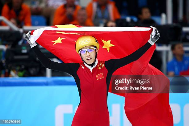 Kexin Fan of China celebrates winning the silver medal in the Short Track Women's 1000m Final A on day fourteen of the 2014 Sochi Winter Olympics at...