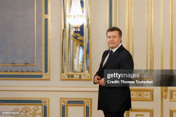 Ukrainian President Viktor Yanukovych arrives before the signing of the Agreement in the Presidential Palace on February 21, 2014 in Kiev, Ukraine....