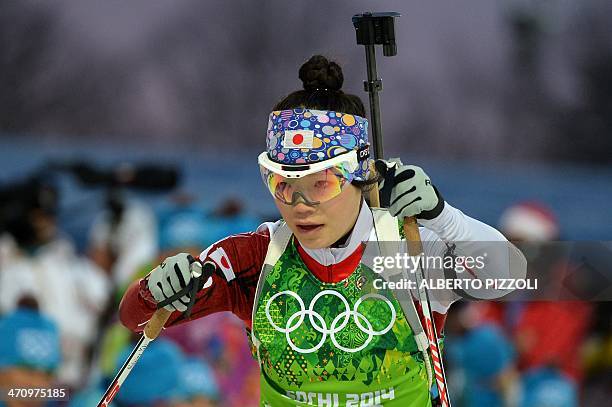 Japan's Yuki Nakajima competes in the Women's Biathlon 4x6 km Relay at the Laura Cross-Country Ski and Biathlon Center during the Sochi Winter...