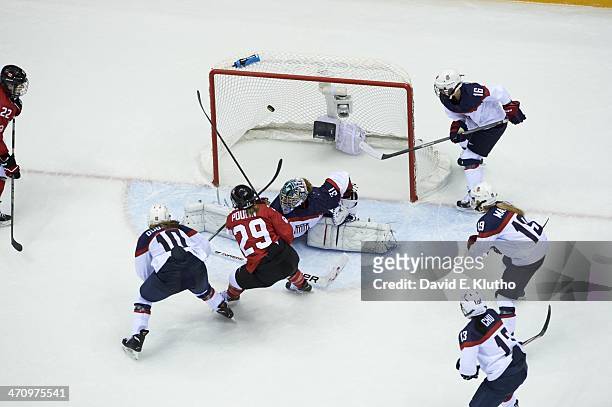 Winter Olympics: Canada Marie-Philip Poulin in action, scoring goal to tie game 2-2 and force overtime vs USA goalie Jessie Vetter during Women's...