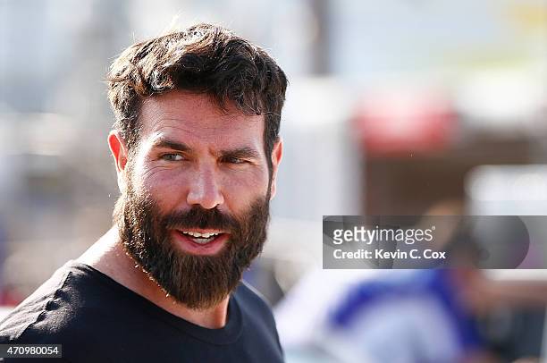 Poker player Dan Bilzerian attends qualifying for the NASCAR Sprint Cup Series Toyota Owners 400 at Richmond International Raceway on April 24, 2015...