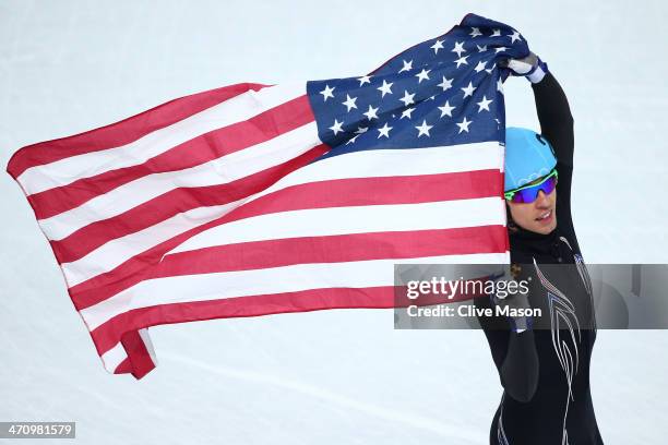 Jordan Malone of the United States celebrates winning the silver medal in the Short Track Men's 5000m Relay on day fourteen of the 2014 Sochi Winter...