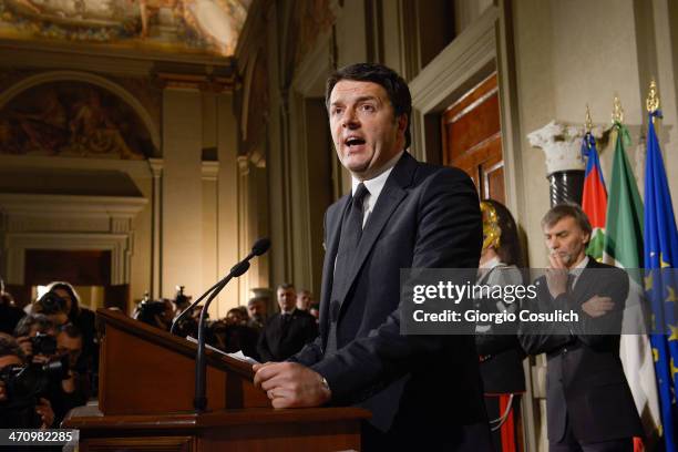 Italian Prime Minister Matteo Renzi speaks during a press conference to announce the names of his new cabinet ministers after a meeting with Italy's...