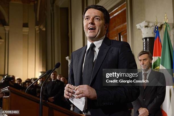 Italian Prime Minister Matteo Renzi speaks during a press conference to announce the names of his new cabinet ministers after a meeting with Italy's...