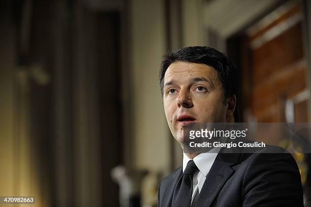 Italian Prime Minister Matteo Renzi speaks during a press conference to announce the names of his new cabinet ministers after a meeting with Italy's...