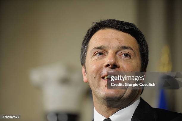 Italian Prime Minister Matteo Renzi speaks during a press conference to announce the names of his new cabinet ministers after a meeting with Italy's...