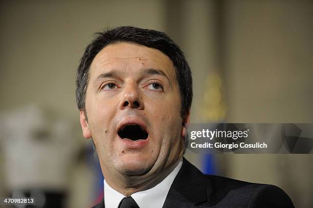 Italian Prime Minister Matteo Renzi speaks during a press conference to announce the names of his new cabinet ministers after a meeting with Italy's...