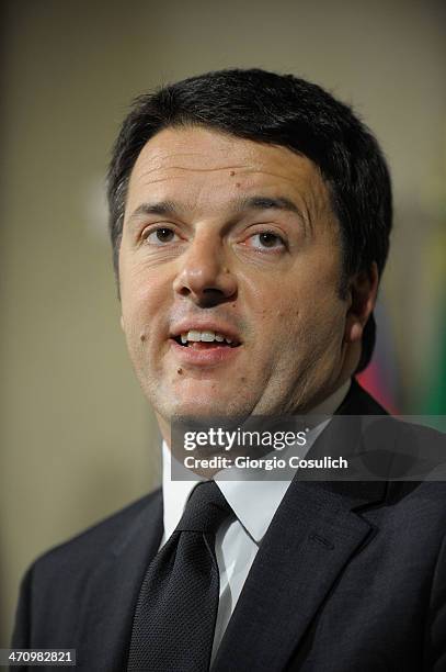 Italian Prime Minister Matteo Renzi speaks during a press conference to announce the names of his new cabinet ministers after a meeting with Italy's...