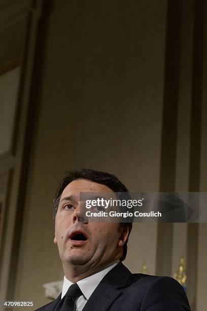 Italian Prime Minister Matteo Renzi speaks during a press conference to announce the names of his new cabinet ministers after a meeting with Italy's...