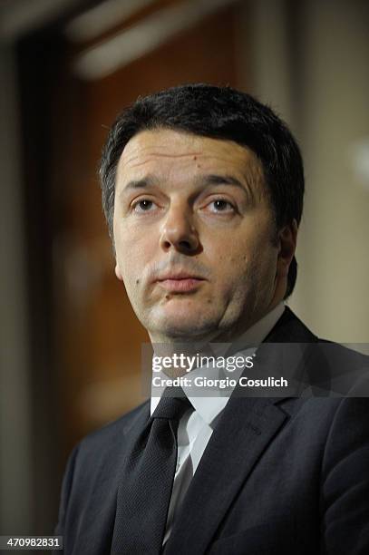 Italian Prime Minister Matteo Renzi speaks during a press conference to announce the names of his new cabinet ministers after a meeting with Italy's...