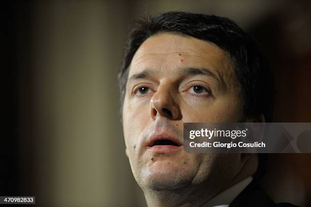 Italian Prime Minister Matteo Renzi speaks during a press conference to announce the names of his new cabinet ministers after a meeting with Italy's...