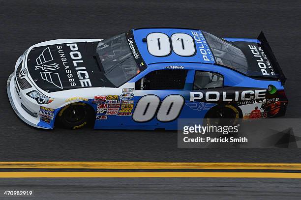Jason White, driver of the Police Sunglasses/Friday Night Tykes Toyota, on track during qualifying for the NASCAR Nationwide Series DRIVE4COPD 300 at...