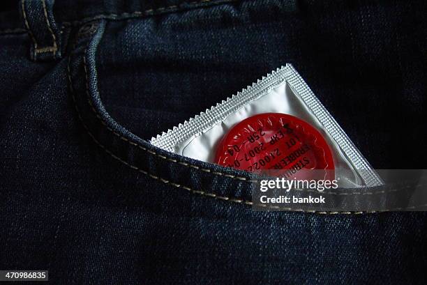 condom in pocket - condom stock pictures, royalty-free photos & images