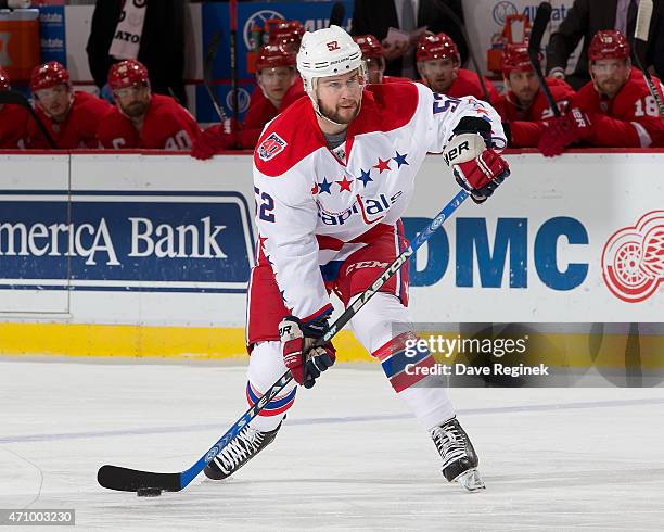 Mike Green of the Washington Capitals shoots the puck during a NHL game against the Detroit Red Wings on April 5, 2015 at Joe Louis Arena in Detroit,...