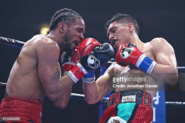 Eddie Ramirez hits Jerome Rodriguez during a junior welterweight fight at the UIC Pavilion on April 24, 2015 in Chicago, Illinois.