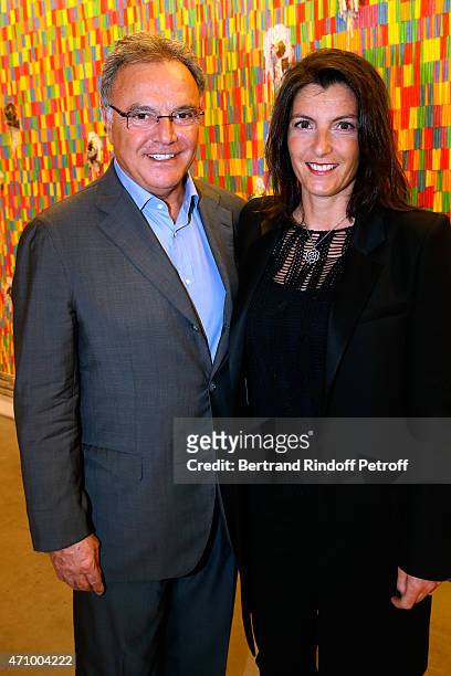 Alain Afflelou with his wife Christine attend the 'A Moment of Reconstruction' - Informal Dinner and Concert held at VNH Gallery on April 24, 2015 in...